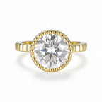 Lumière Bezel Moissanite Ring – round moissanite in sleek bezel setting in solid gold by Lunara
