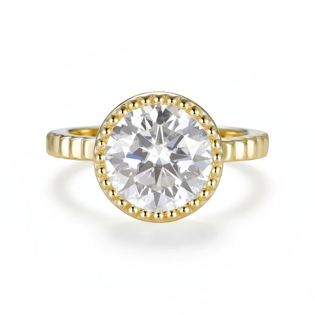Lumière Bezel Moissanite Ring – round moissanite in sleek bezel setting in solid gold by Lunara
