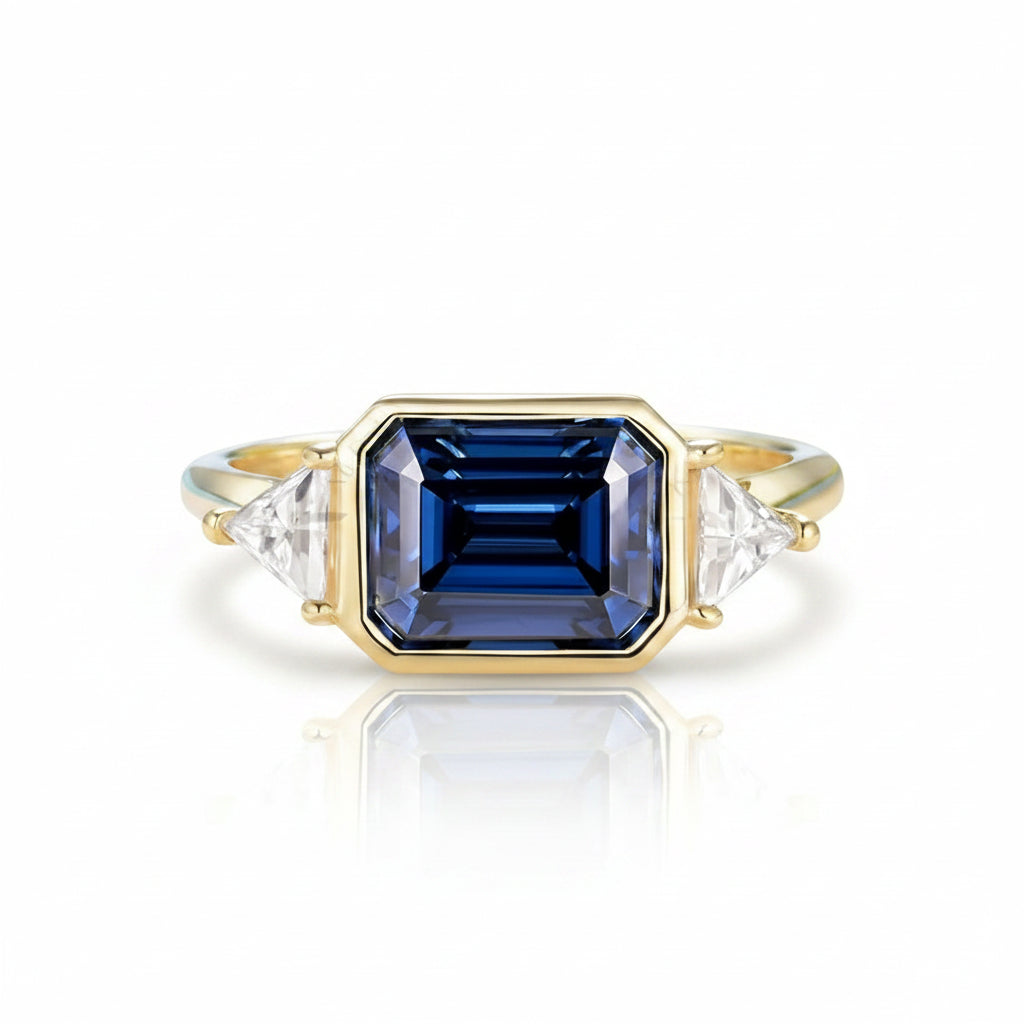 Brume Grise Moissanite Emerald Ring – grey moissanite emerald cut in solid gold by Lunara