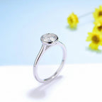 Clarté Bezel Moissanite Ring – yellow gold option
