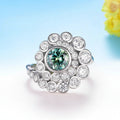 Vague Cyan Moissanite Spiral Ring – close-up of cyan stone