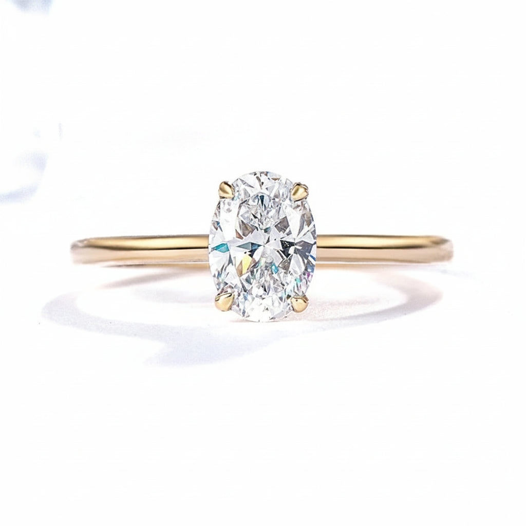 Lumière Ovale Moissanite Solitaire Ring – oval moissanite solitaire in solid gold by Lunara