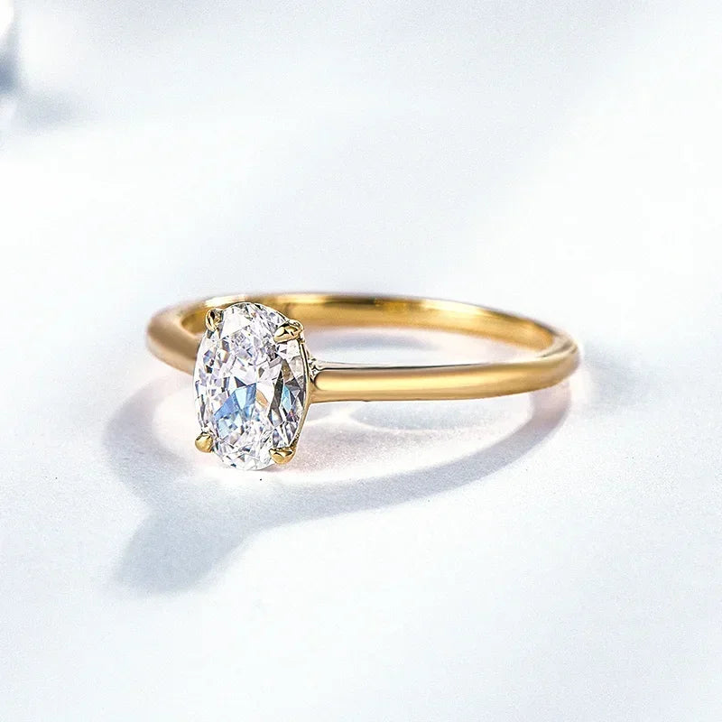 Lumière Ovale Moissanite Solitaire Ring – worn on hand