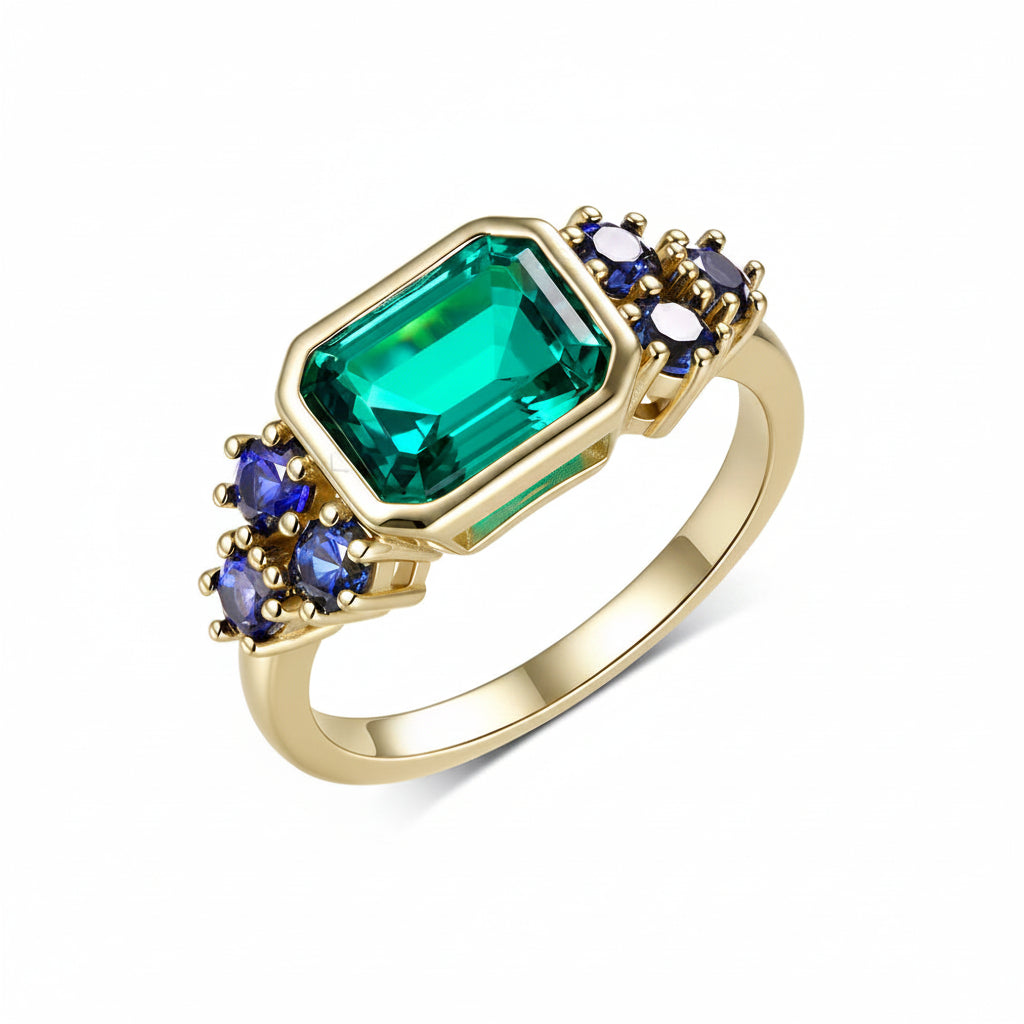 Trilogie Moissanite Emerald Sapphire Ring – top view of three stones